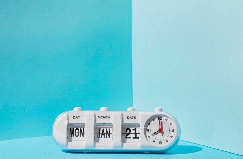 A white date-clock displays "Mon, Jan 21" against a two-tone blue background